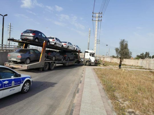 توقیف تریلی خودروهایی که مالکانش با پرواز به بوشهر آمده بودند!+تصویر و توضیحات